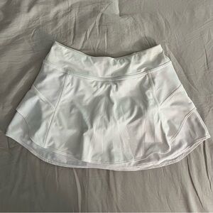 white XXS athleta tennis skirt with built-in shorts!
